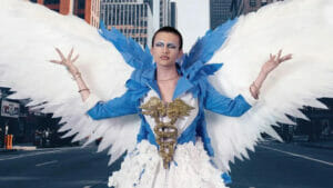 CJ King poses in Times Square | GLAAD