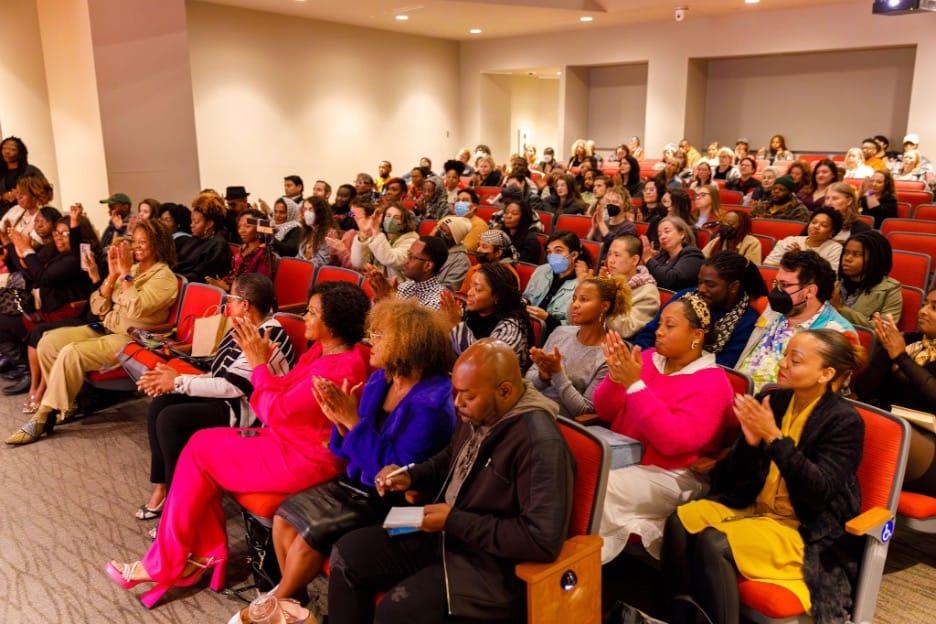 Audience members applaud during “The Risk It Takes To Bloom” book event at Auburn Avenue Research Library on December 5 in Atlanta. | GLAAD Audience members applaud during “The Risk It Takes To Bloom” book event at Auburn Avenue Research Library on December 5 in Atlanta.