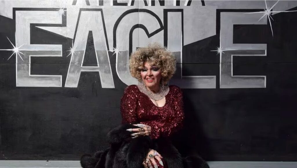 Charlie Brown, a drag performer, poses for a portrait prior to a show Saturday, June 17, 2023 at the Atlanta Eagle. (Daniel Varnado/ For the AJC)