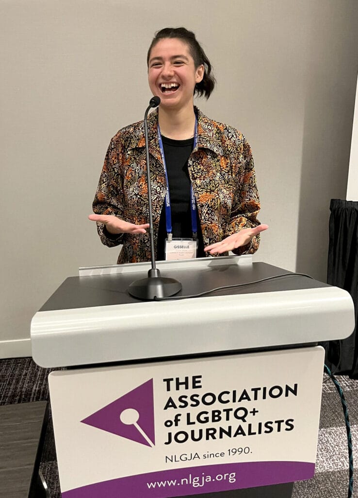Gisselle speaking at the Association of LGBTQ+ Journalists (NLGJA) convention about their photo essay about Queer joy in Philadelphia, 2023. Photo courtesy of author | GLAAD Gisselle speaking at the Association of LGBTQ+ Journalists (NLGJA) convention about their photo essay about Queer joy in Philadelphia, 2023. Photo courtesy of author
