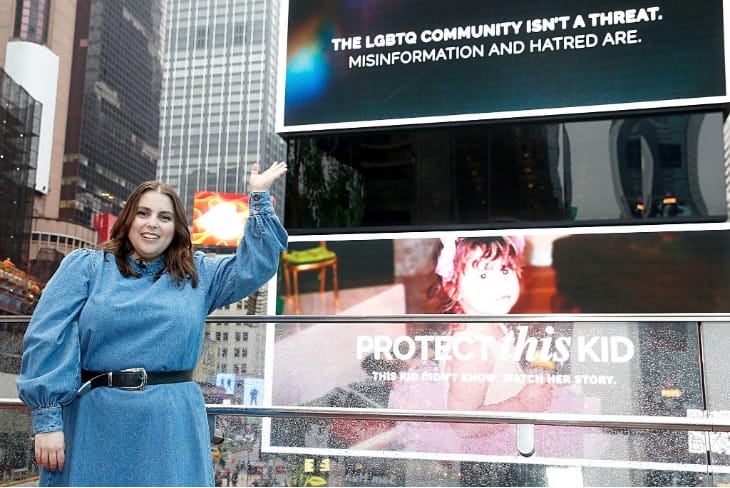 Beanie Feldstein, launched “Protect This Kid,” revealing her campaign creative on a Times Square digital billboard | GLAAD Beanie Feldstein, launched “Protect This Kid,” revealing her campaign creative on a Times Square digital billboard