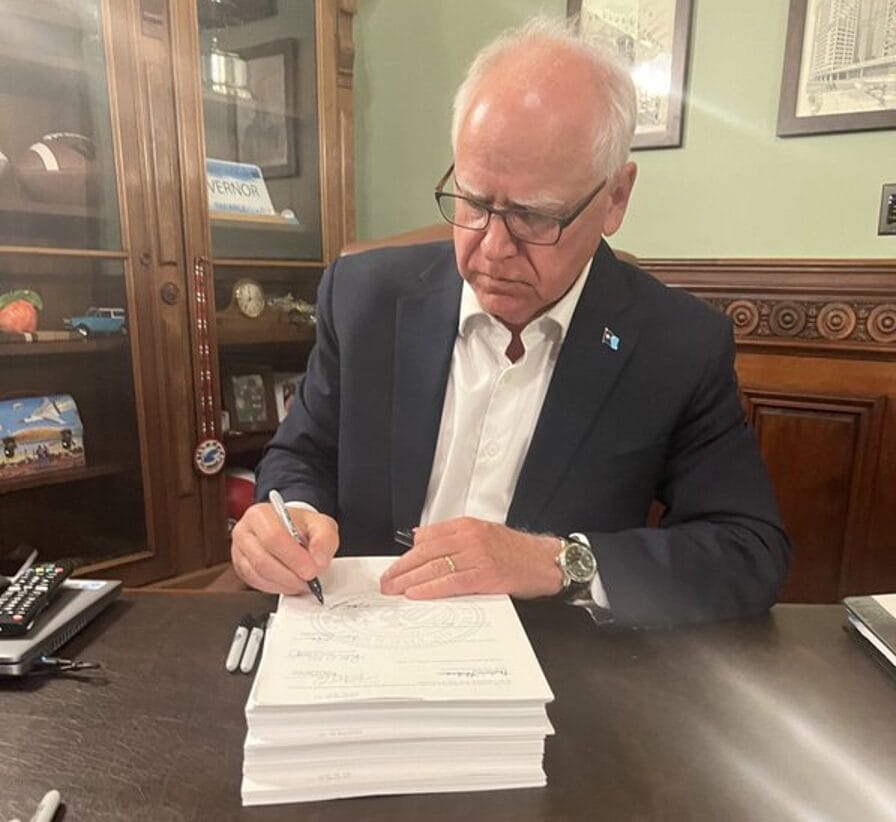 Minnesota Gov. Tim Walz signs a bill into law. Photo credit: Gov. Tim Walz’ X account | GLAAD Minnesota Gov. Tim Walz signs a bill into law. Photo credit: Gov. Tim Walz’ X account