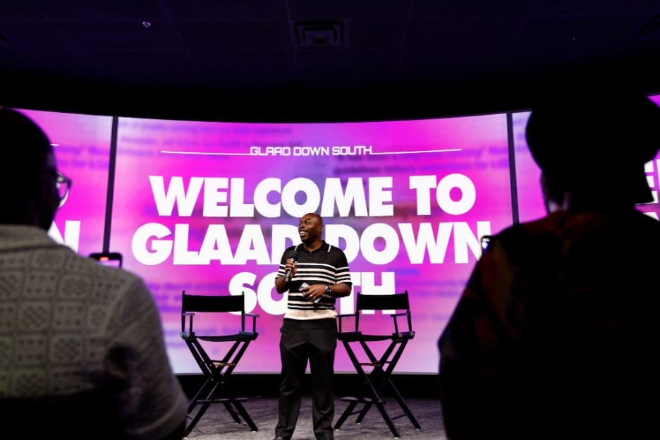 Darian Aaron, Director of Local News: U.S. South at GLAAD, address audience at GLAAD Down South on May 17, 2024, in Atlanta.