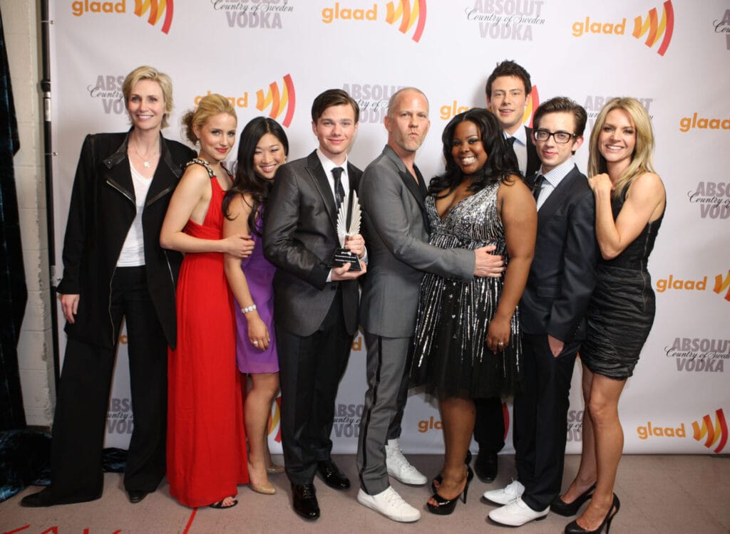 Jane Lynch, Dianna Agron, Jenna Ushkowitz, Chris Colfer, Ryan Murphy, Amber Riley, Cory Monteith, Kevin McHale and Jessalyn Gilsig backstage at the 21st Annual GLAAD Media Awards held at Hyatt Regency Century Plaza Hotel on April 17, 2010 in Los Angeles, California. | GLAAD Jane Lynch, Dianna Agron, Jenna Ushkowitz, Chris Colfer, Ryan Murphy, Amber Riley, Cory Monteith, Kevin McHale and Jessalyn Gilsig backstage at the 21st Annual GLAAD Media Awards held at Hyatt Regency Century Plaza Hotel on April 17, 2010 in Los Angeles, California.