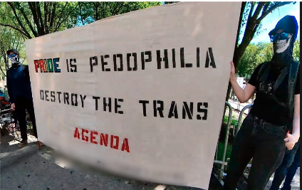 Two members of the White Lives Matter network hold an offensive banner at a Pride parade in Chicago. | GLAAD Two members of the White Lives Matter network hold an offensive banner at a Pride parade in Chicago.