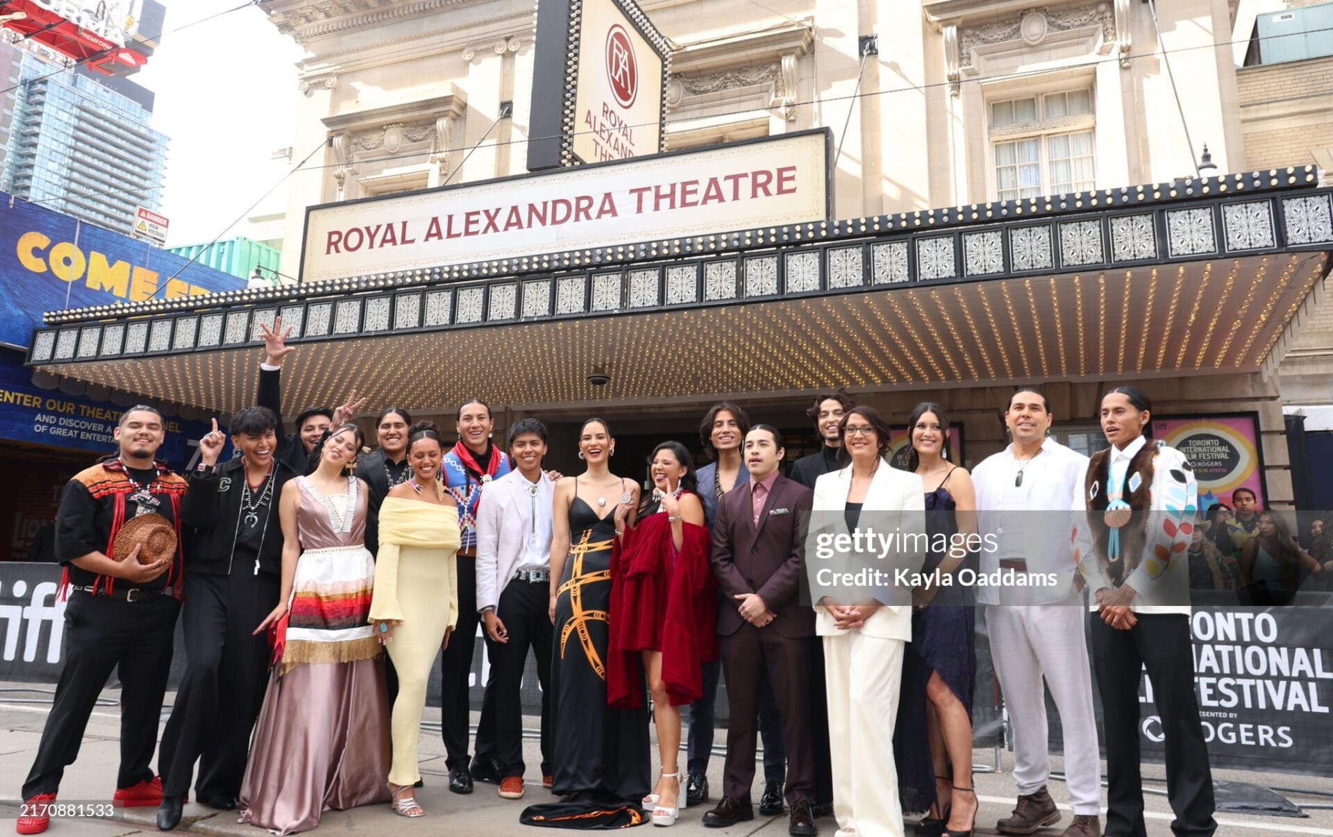 Director Sydney Freeland (white suit) and her cast and crew celebrate the premiere of REZ BALL | GLAAD