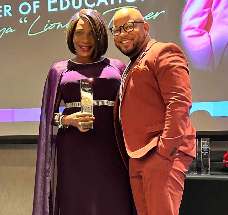 Pioneer of Education Award recipient Simaya Charlize Turner poses with The Trans Life Awards President and CEO Dewayne Queen at the awards ceremony in Atlanta, GA, on August 31, 2024. | GLAAD Pioneer of Education Award recipient Simaya Charlize Turner poses with The Trans Life Awards President and CEO Dewayne Queen at the awards ceremony in Atlanta, GA, on August 31, 2024.