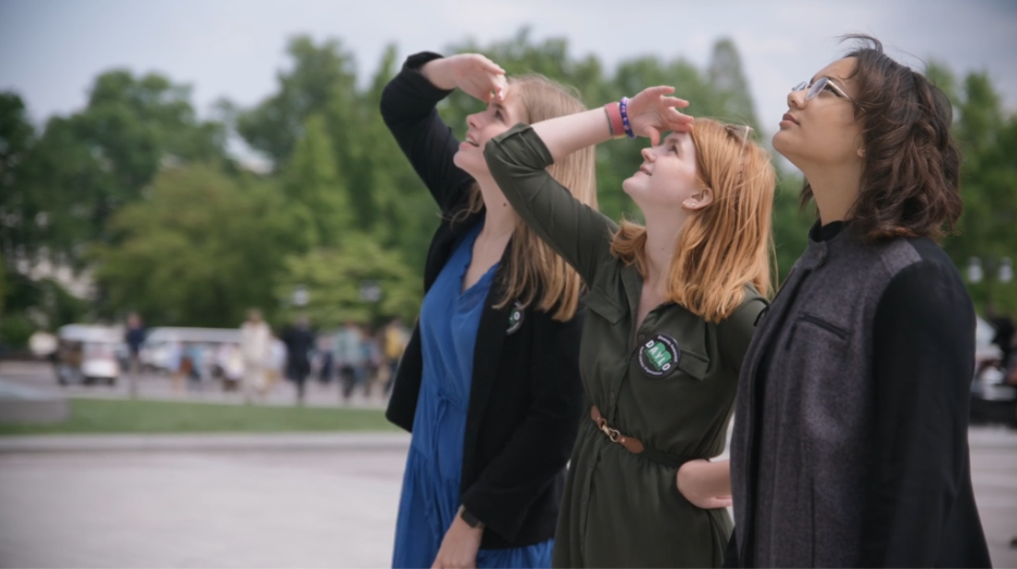 Left-to-right: Student activists Elizabeth Foster, Millie Bennett, and Isabella Troy Brazoban glance upward at the United States Capitol. | GLAAD Left-to-right: Student activists Elizabeth Foster, Millie Bennett, and Isabella Troy Brazoban glance upward at the United States Capitol.