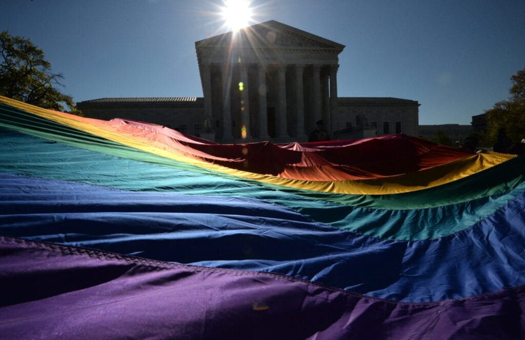 Pride Flag in front of the capitol building