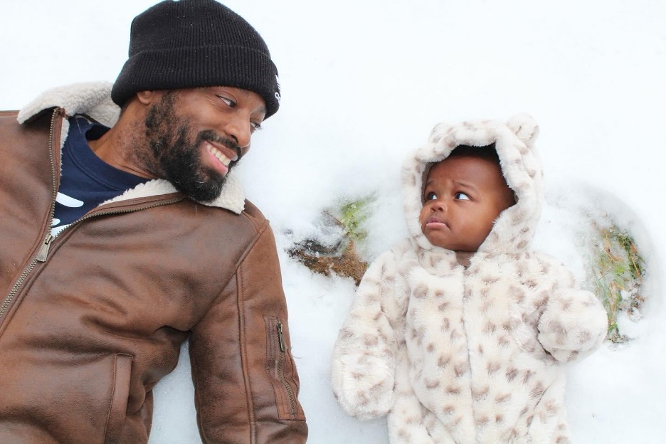 Biancco Gardner shares a tender moment with his five-month-old daughter Bianca, which he conceived via surrogate.