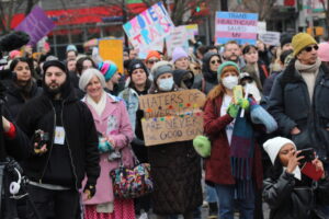 IMG_2589 | GLAAD People line up in Union Square to protest denial of trans healthcare with various signs like "Gender affirming care saved my life," and "haters of diversity are never the good guys"