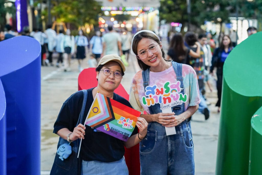 BANGKOK, THAILAND - 2024/09/25: A lesbian couple pose for a photo as they celebrate the marriage equality bill at Siam Square, Bangkok. Thailand's landmark marriage equality bill has been officially written into law, allowing same-sex couples to legally wed. The law was published in the Royal Gazette after endorsement by King Maha Vajiralongkorn and will come into effect in 120 days. (Photo by Seksan Rochanametakul/SOPA Images/LightRocket via Getty Images)