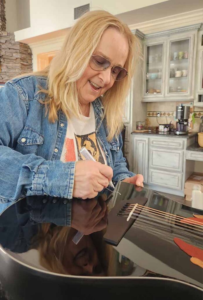 Melissa Etheridge with guitar | GLAAD Melissa Etheridge with guitar