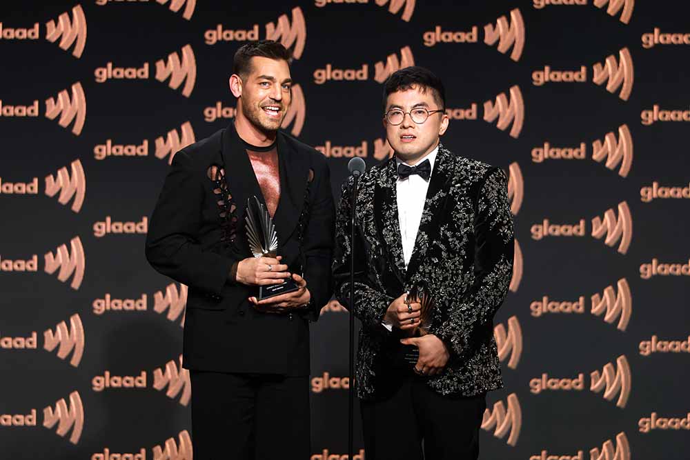 (L-R) Matt Rogers and Bowen Yang accept an award onstage during the 37th Annual GLAAD Media Awards at The Beverly Hilton on March 05, 2026 in Beverly Hills, California. | GLAAD Matt Rogers and Bowen Yang accept an award onstage during the 37th Annual GLAAD Media Awards