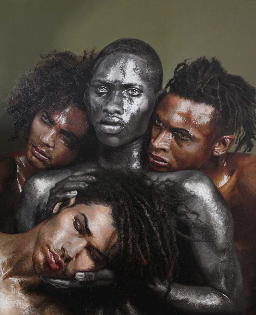 Group of four people closely embracing; the central figure is painted silver while the others lean on and support him, conveying unity and solidarity.